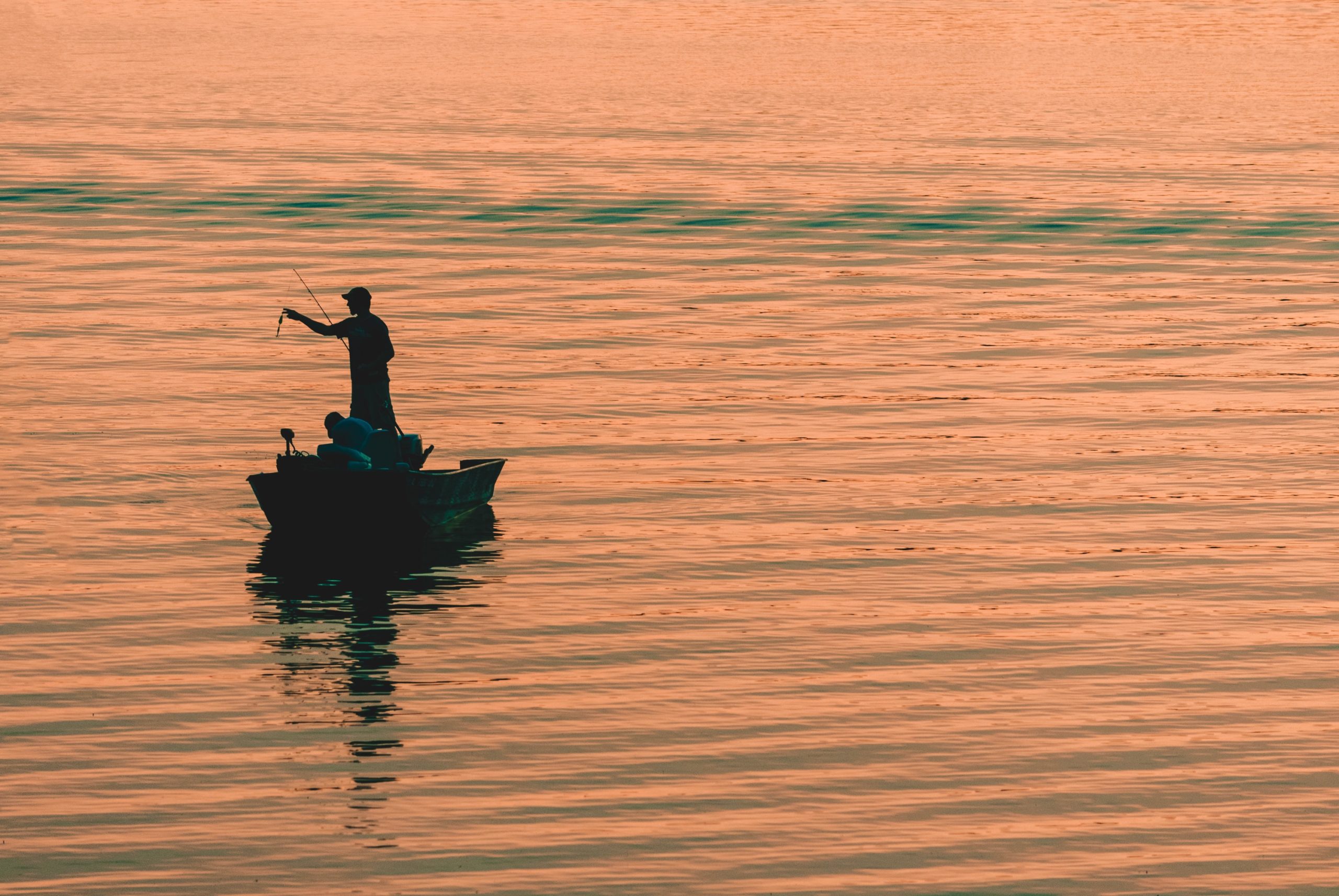 kelly-sikkema-_YFFMJrtV1g-unsplash – father and the fish